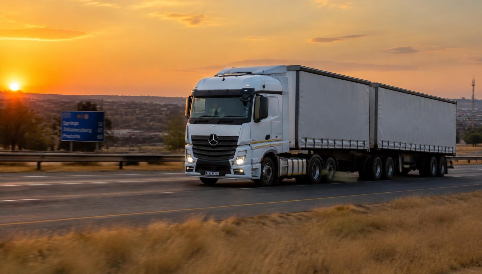 Truck on a Gauteng highway at sunset